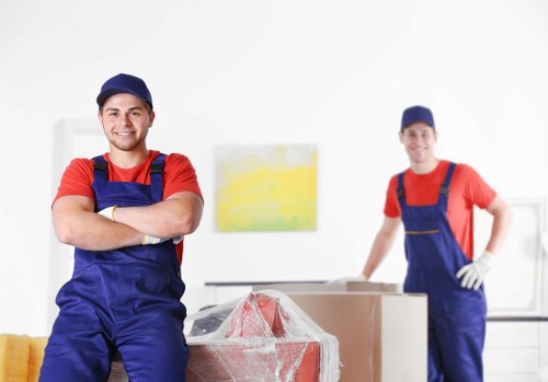 Office removal team planning a relocation in a Spanish city centre