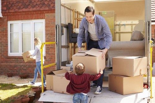 Moving home in Spain with boxes and furniture ready for transport