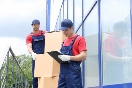Removal team handling boxes safely during a move