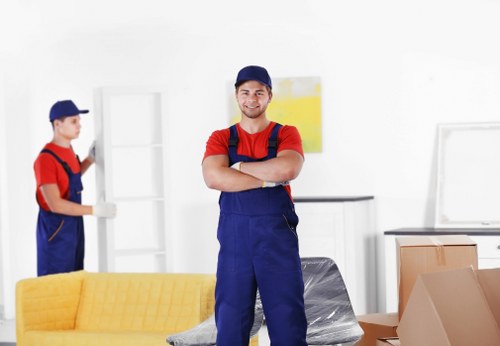 Professional moving van loading in a Spanish residential area