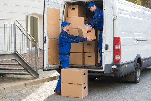 Removal van loading household furniture for a local move in Spain