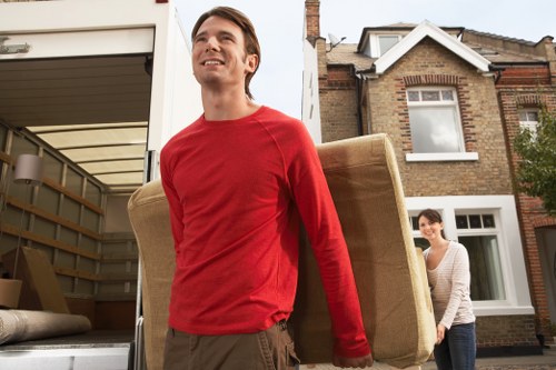 Donation-ready furniture and reusable goods loaded for charity partnership