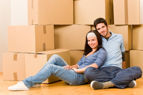 Furniture and boxes being transported by a man and van service