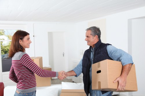 Loading boxes and furniture into a van for a Spanish property move