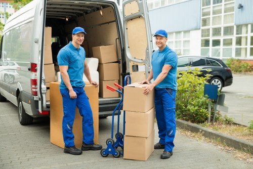 Local transport helper handling apartment move access in Spain