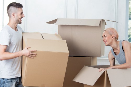 Prepared moving boxes and furniture ready for removal van transport in Spain