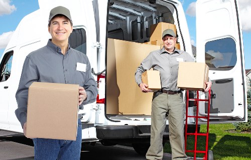 Packed office furniture and equipment ready for transport in Spain