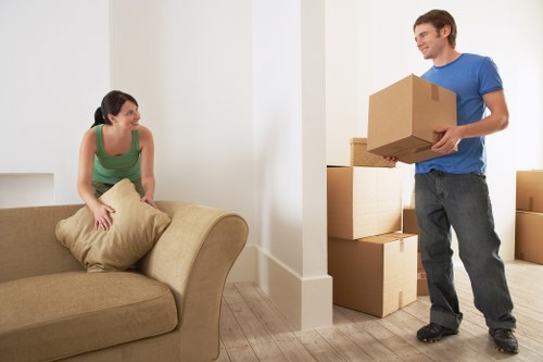 Local removal van service handling apartment access in Spain